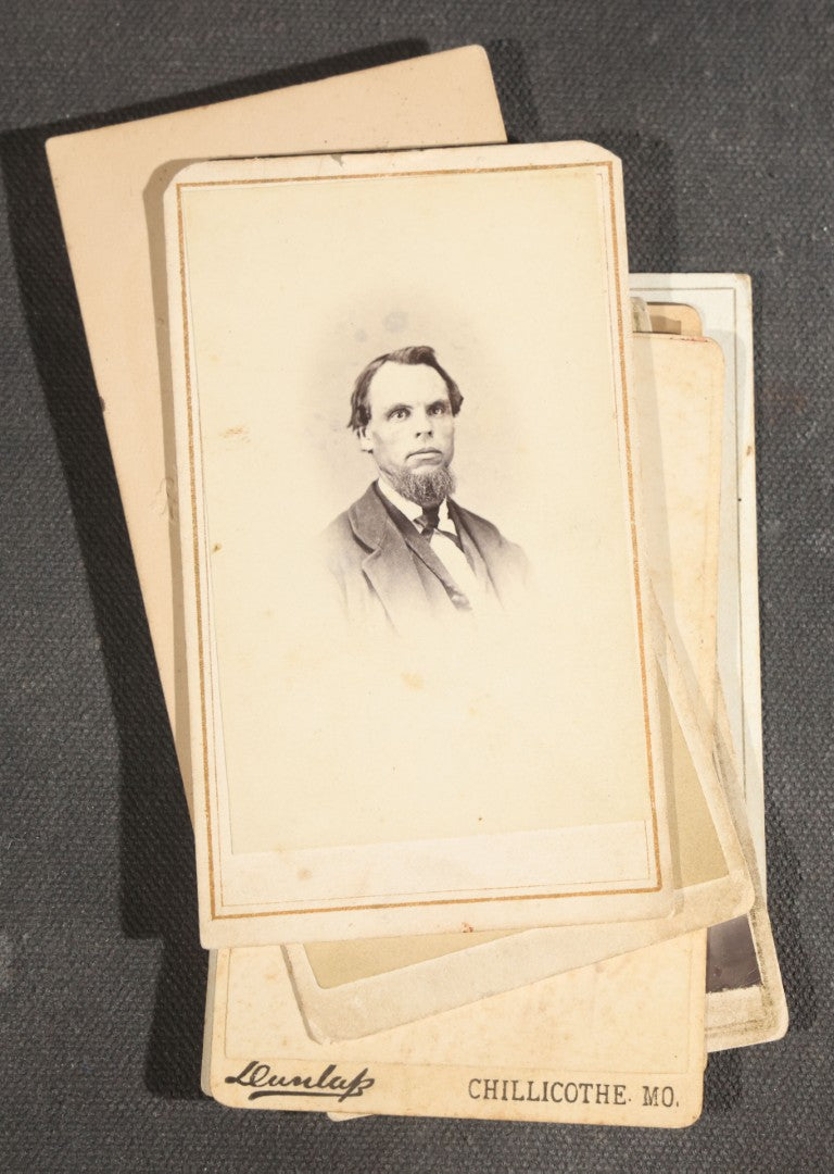 Grouping of Nine Antique Photographs including Two Tintype Photographs and Seven Carte de Visite C.D.V. Portraits, Babies, Children, Young Men, and Young Woman, One by Dunlap, Chillicothe, Missouri