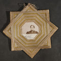 Lot 137 - Antique Handmade Thread-Wrapped Star Frame with Portrait Photograph of a Woman, Inscribed "Lindie Mallow", 7" W x 7" H
