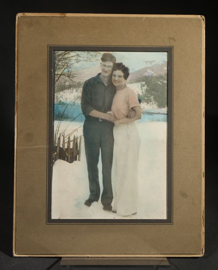 Vintage Tinted Photograph of a Couple Posed Before a Winter Landscape, in paper frame
