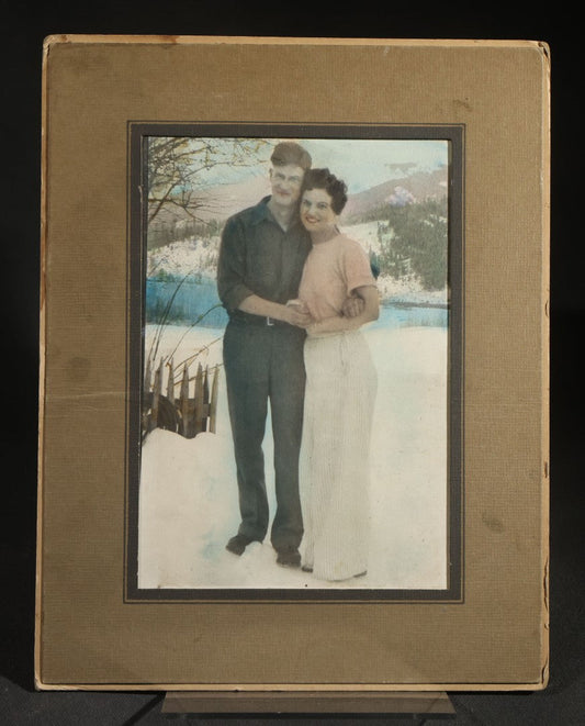 Vintage Tinted Photograph of a Couple Posed Before a Winter Landscape, in paper frame