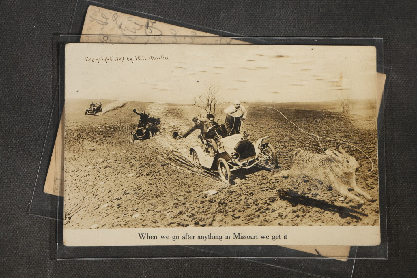 Grouping of Six Antique Exaggeration Real Photo Postcards R.P.P.C., Photographed by W.H. Martin, Including "The Largest Ear of Corn Grown in Mo.," "Watermelons Grow Big in Kans.," And "Our County Fair Contest on Corn," 1907-1910