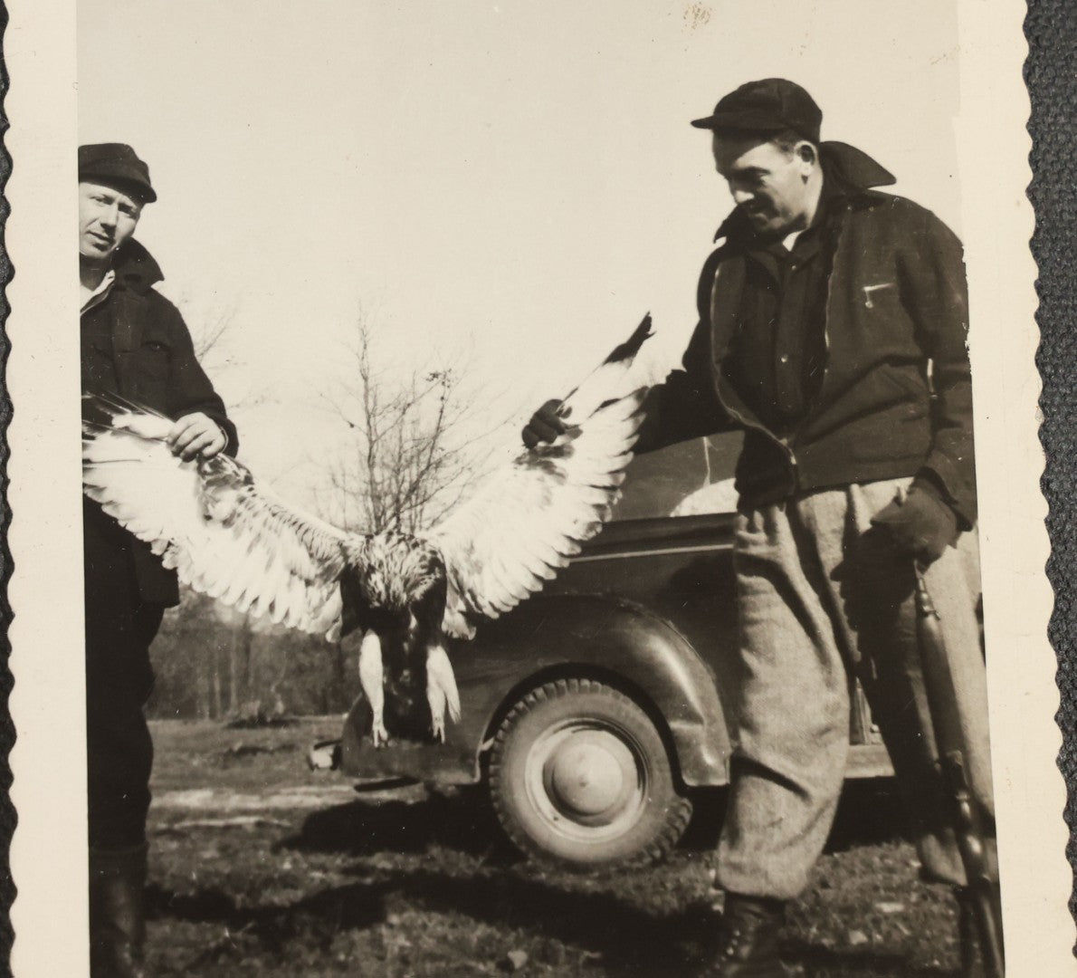 Grouping of 12 Vintage Hunting Snapshot Photographs, Men with Harvested Deer and Birds, Deer on Car Roof, Jeep, Dogs, and Rural Family Scenes, Circa 1940s-1950s