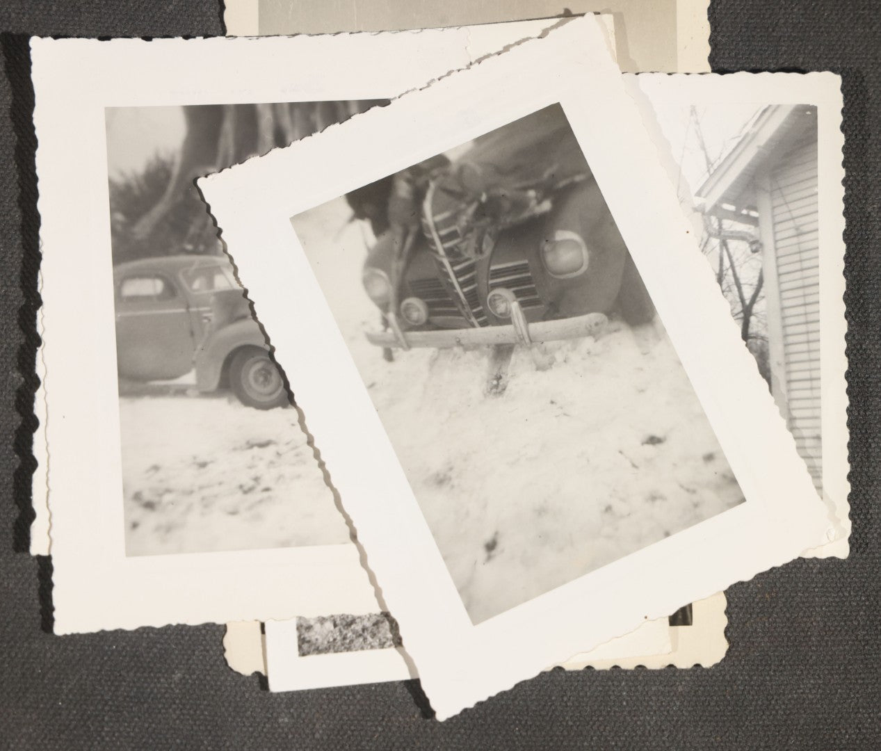 Grouping of 12 Vintage Hunting Snapshot Photographs, Men with Harvested Deer and Birds, Deer on Car Roof, Jeep, Dogs, and Rural Family Scenes, Circa 1940s-1950s