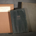 Lot 160 - Trio of Antique and Vintage Poetry and Literature Books Including "Candide" By Voltaire, "Candles That Burn" By Aline Kilmer, and "Flowers of Evil" By Charles Baudelaire