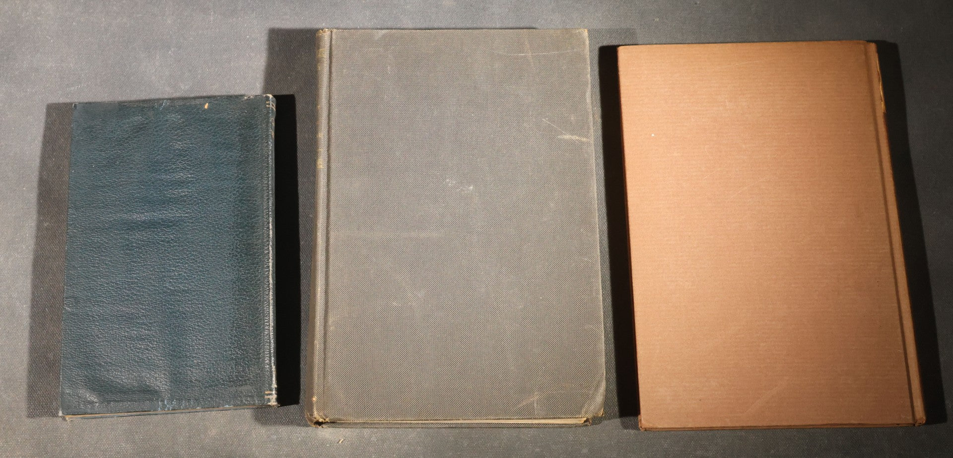 Trio of Antique and Vintage Poetry and Literature Books including "Candide" by Voltaire, "Candles That Burn" by Aline Kilmer, and "Flowers of Evil" by Charles Baudelaire