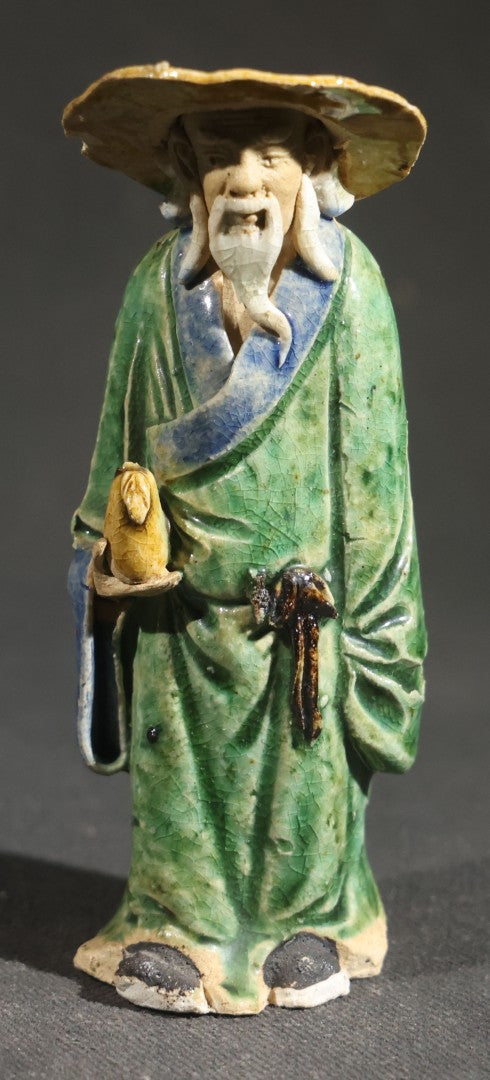 Pair of Vintage Chinese Mudman Ceramic Figurines including Seated Figure on Melon Planter and Standing Elder in Green Robe, Made in China