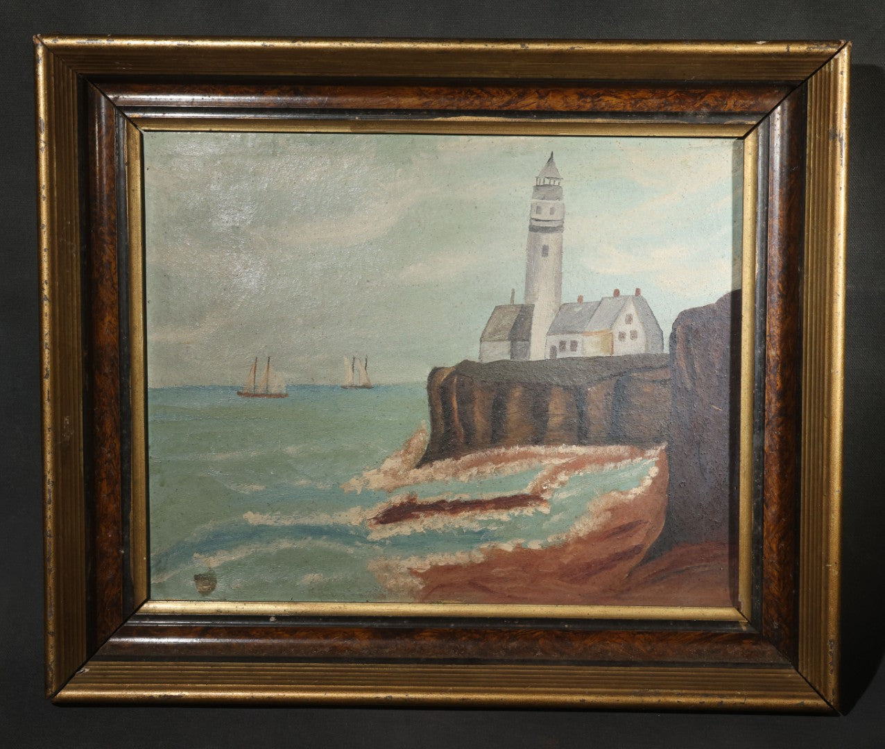 Antique Framed Oil Painting on Board, Coastal Lighthouse on Rocky Cliffs with Sailing Vessels