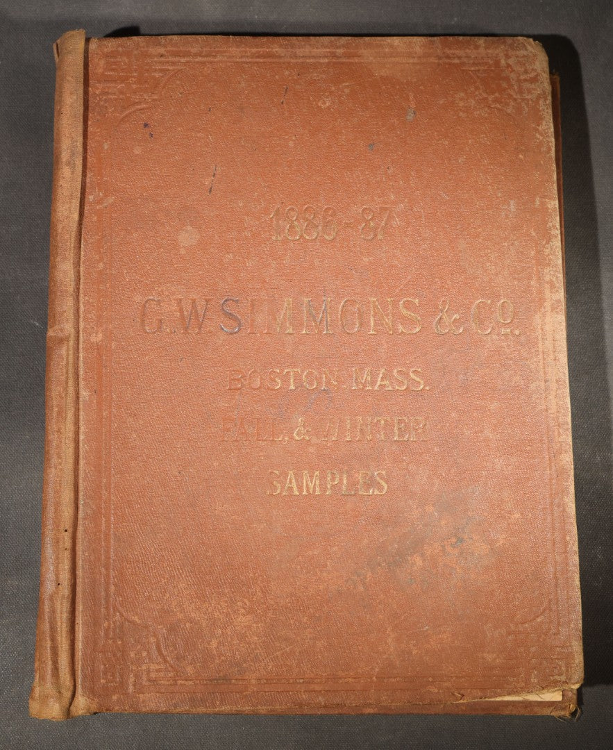 Antique Victorian Scrapbook Assembled in a Repurposed 1886-87 G.W. Simmons & Co. Fall & Winter Samples Catalog, Boston, Massachusetts, with Trade Cards including Reynolds Brothers Fine Shoes, Scoville's Sarsaparilla, and Loewenstine & Co.