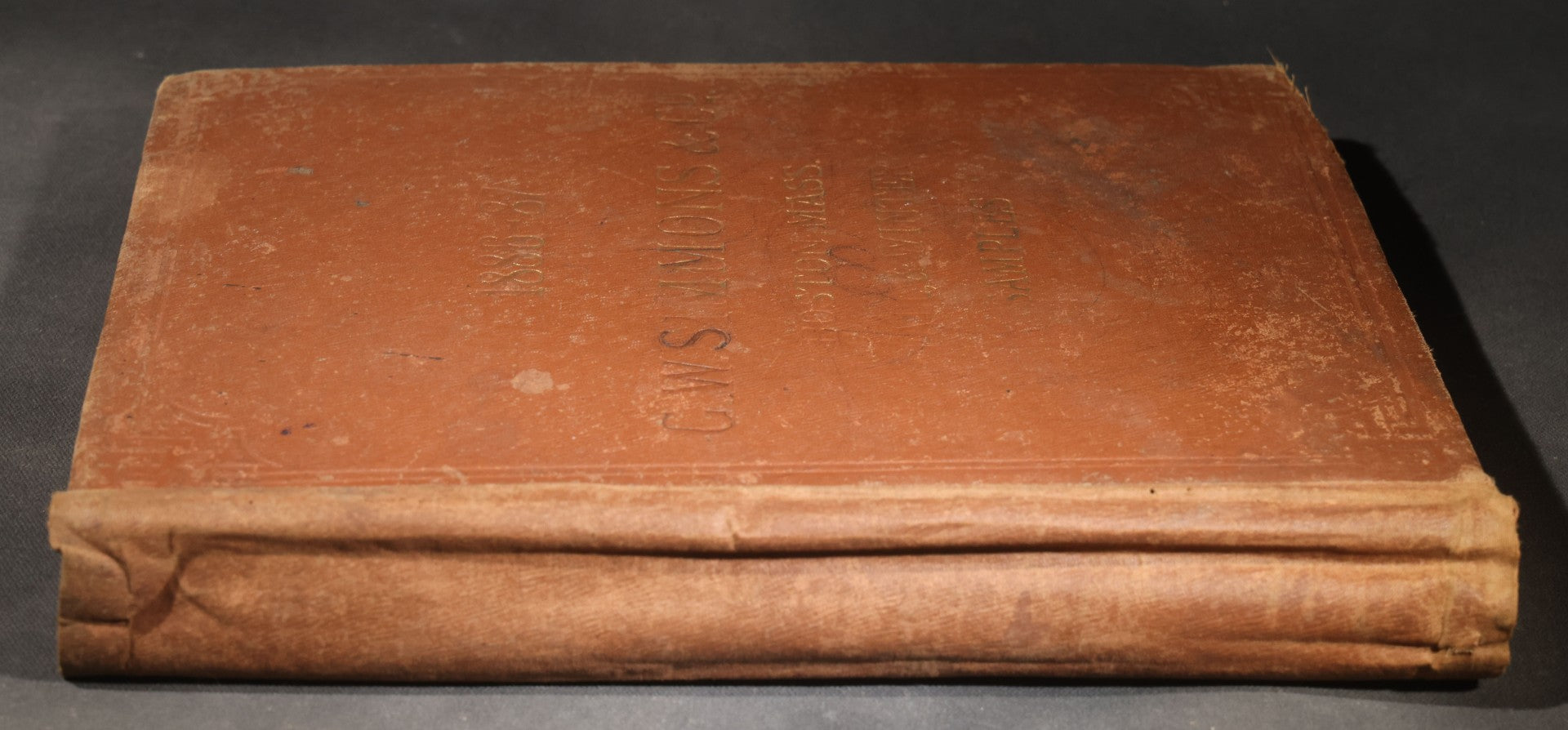 Antique Victorian Scrapbook Assembled in a Repurposed 1886-87 G.W. Simmons & Co. Fall & Winter Samples Catalog, Boston, Massachusetts, with Trade Cards including Reynolds Brothers Fine Shoes, Scoville's Sarsaparilla, and Loewenstine & Co.