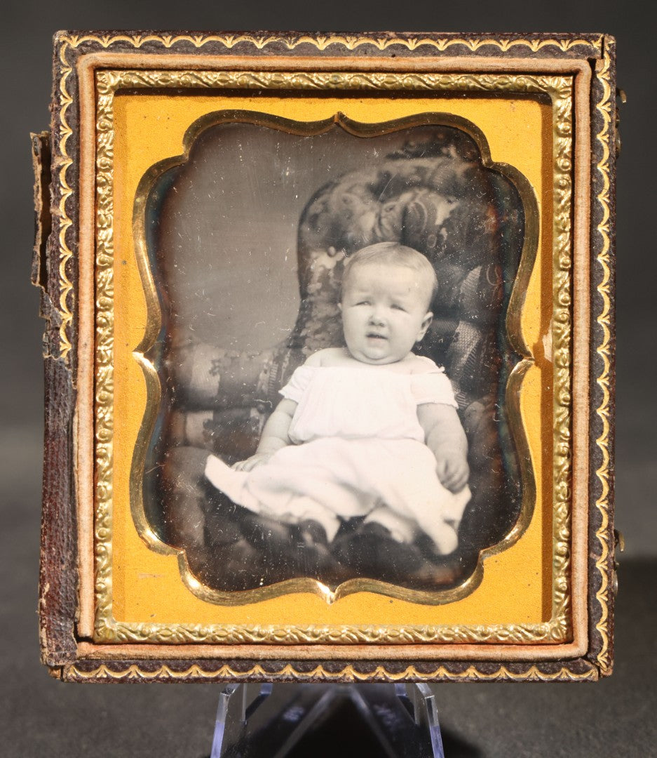Antique 1/6th Plate Daguerreotype Photograph of a Seated Baby in White Gown in Half Leatherette Case with Embossed Floral Design