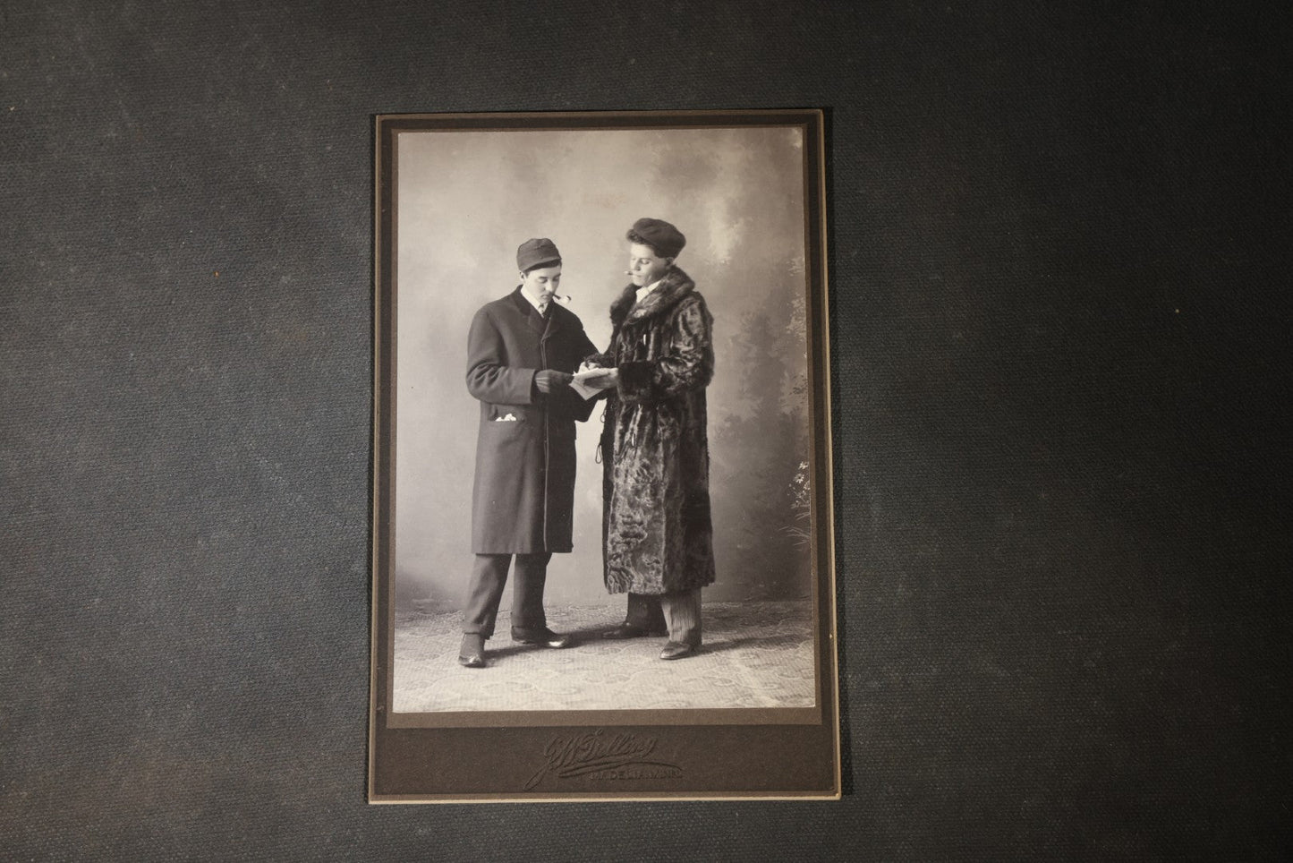 Grouping of 35+ Antique Cabinet Card and Board-Mounted Photographs including Schoolroom Interior and Posed Couple in Fur Coats
