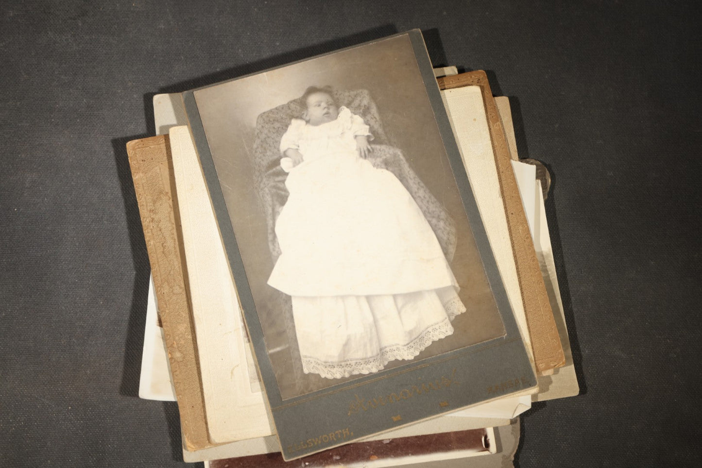 Grouping of 30+ Antique Board-Mounted, Cabinet Card, and Unmounted Photographs including Victorian and Edwardian Portraits, Landscapes, and Group Scenes