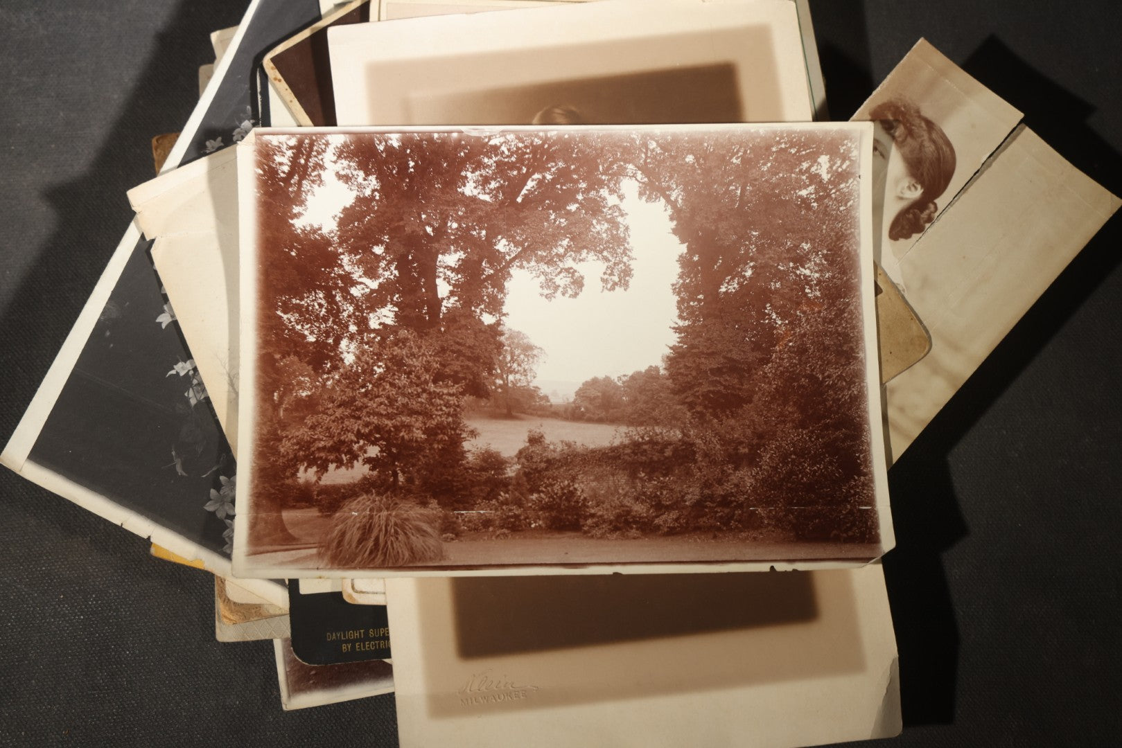 Grouping of 30+ Antique Board-Mounted, Cabinet Card, and Unmounted Photographs including Victorian and Edwardian Portraits, Landscapes, and Group Scenes