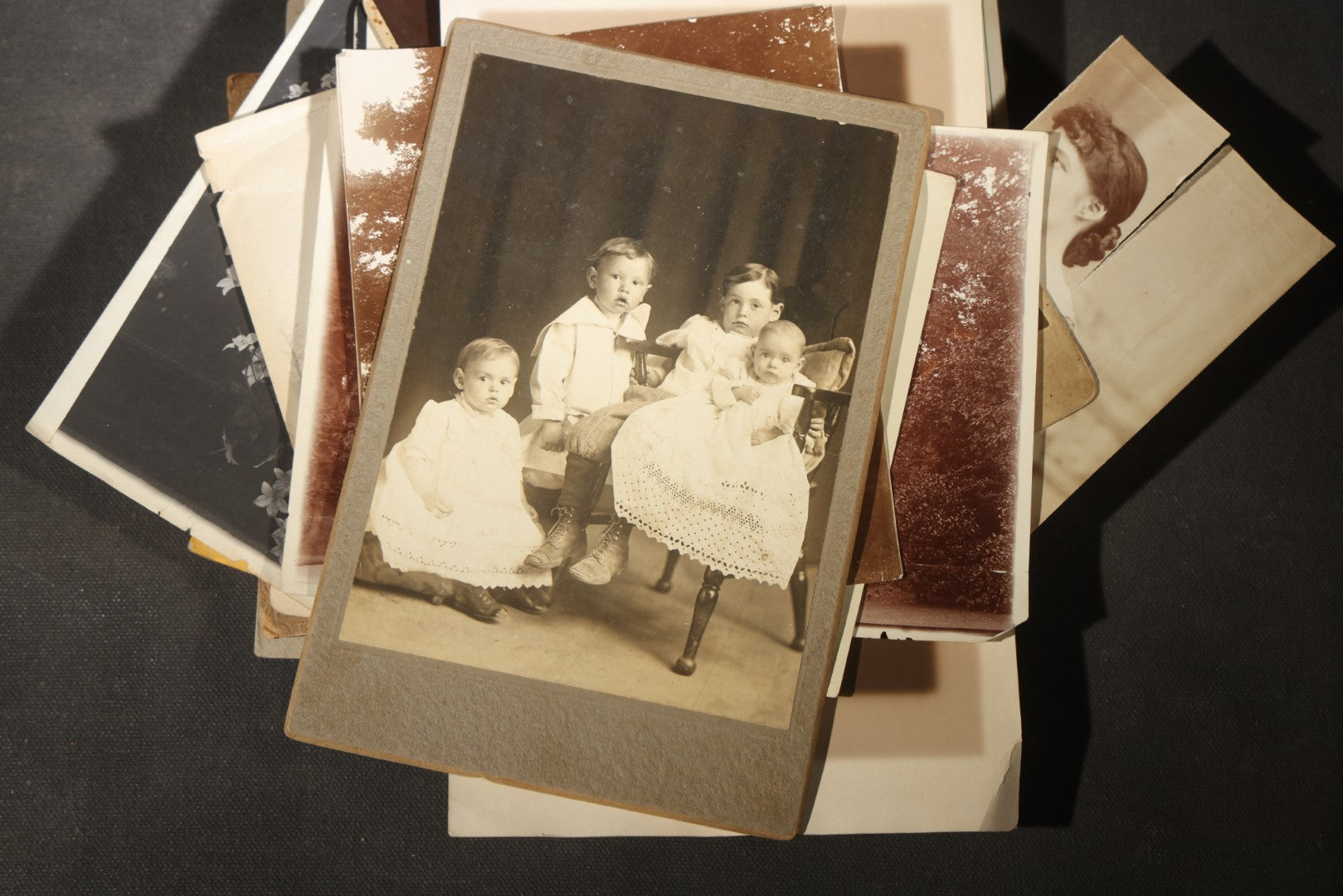 Grouping of 30+ Antique Board-Mounted, Cabinet Card, and Unmounted Photographs including Victorian and Edwardian Portraits, Landscapes, and Group Scenes