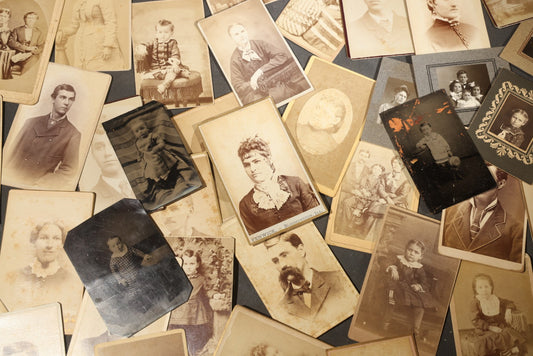 Grouping of 40+ Antique Photographs Including Carte De Visite C.D.V. Portraits, Tintype Photographs, and Board-Mounted Photographs, including young children, women with curled bangs, and more