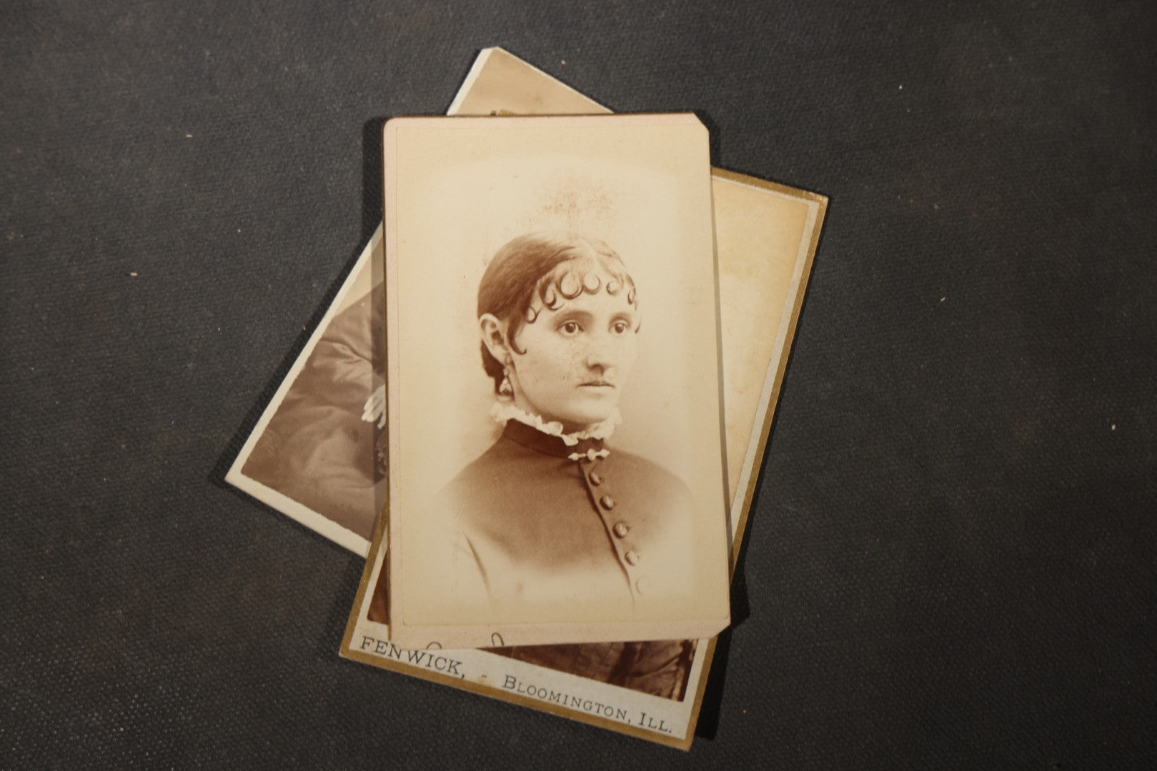 Grouping of 40+ Antique Photographs Including Carte De Visite C.D.V. Portraits, Tintype Photographs, and Board-Mounted Photographs, including young children, women with curled bangs, and more