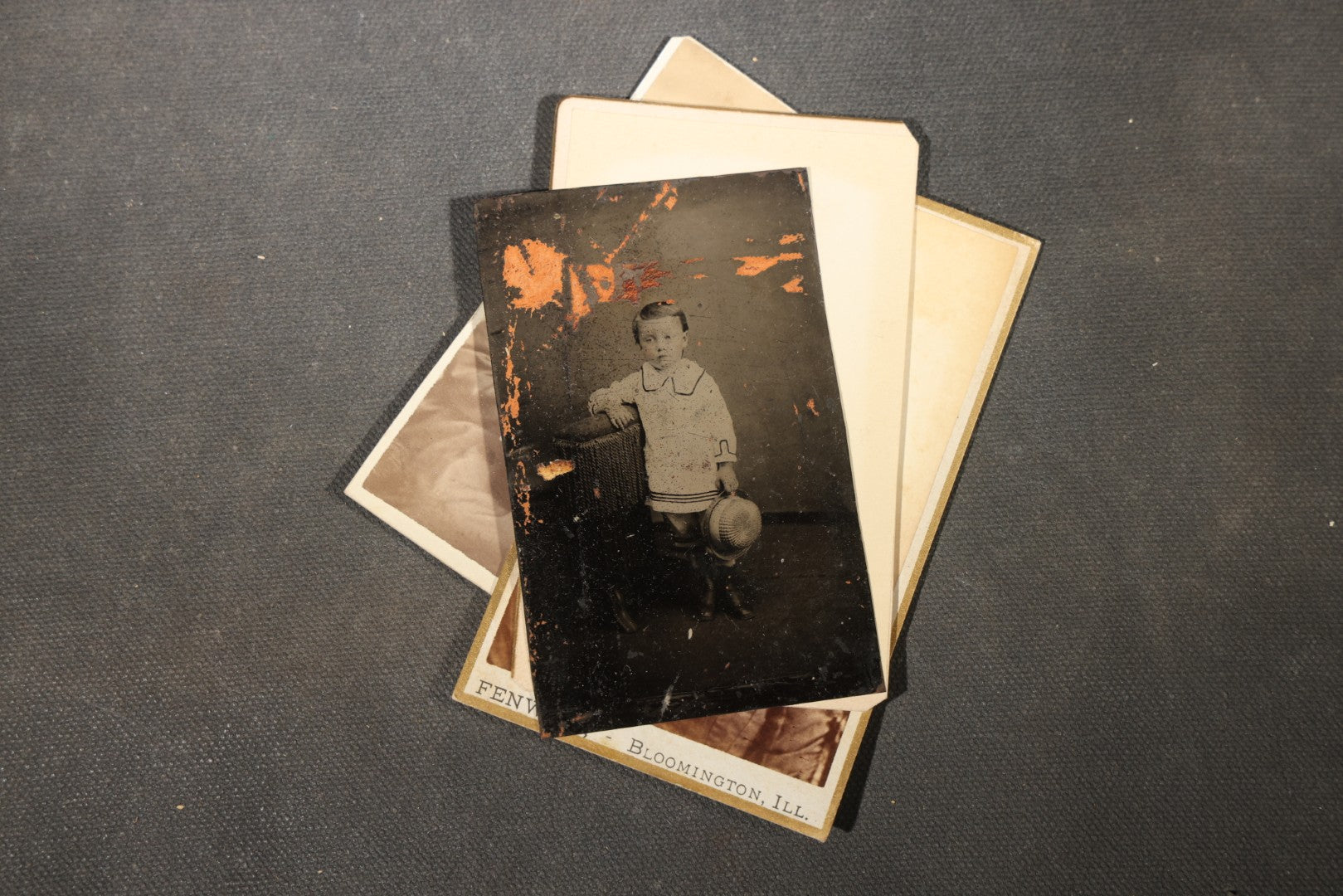 Grouping of 40+ Antique Photographs Including Carte De Visite C.D.V. Portraits, Tintype Photographs, and Board-Mounted Photographs, including young children, women with curled bangs, and more