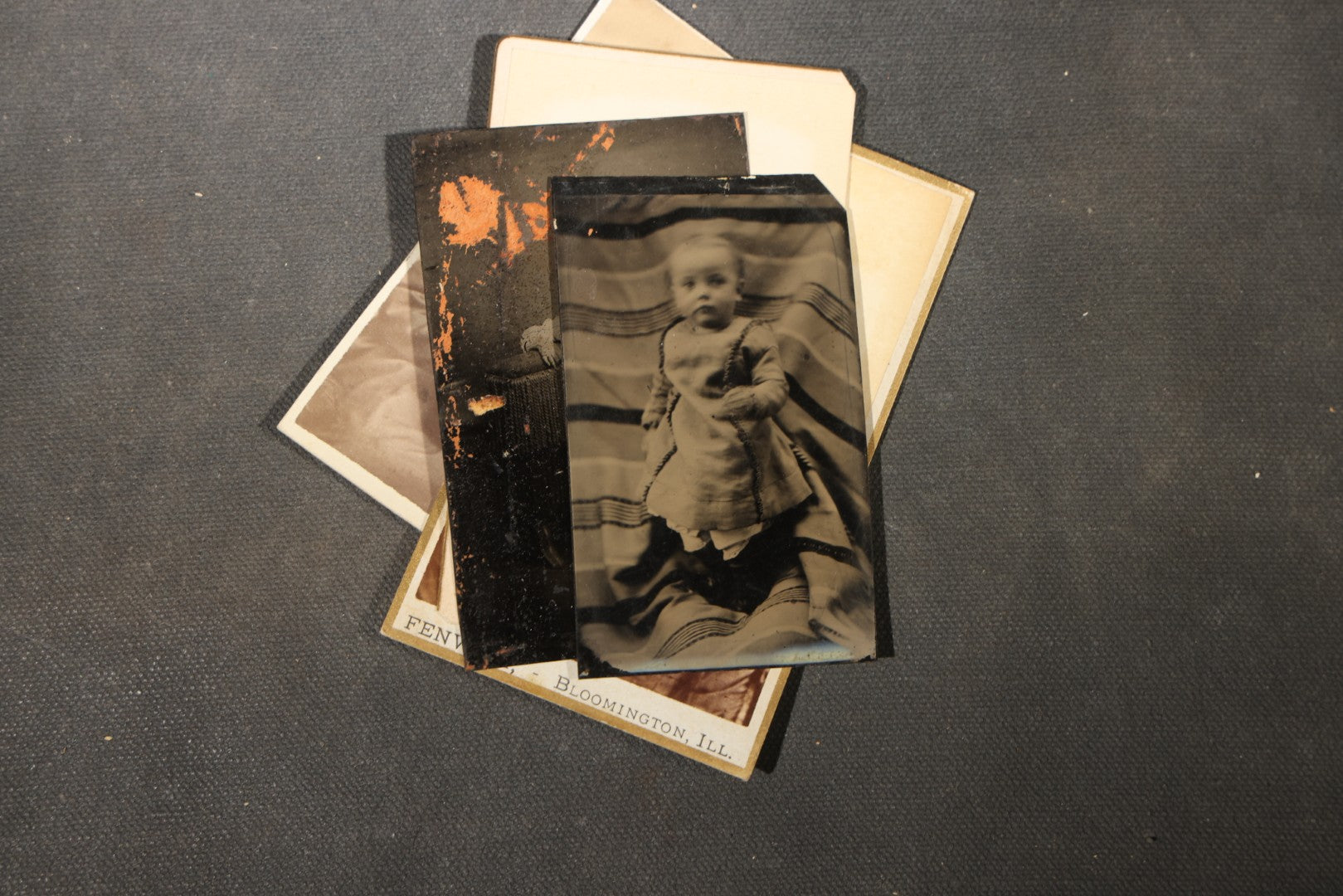 Grouping of 40+ Antique Photographs Including Carte De Visite C.D.V. Portraits, Tintype Photographs, and Board-Mounted Photographs, including young children, women with curled bangs, and more