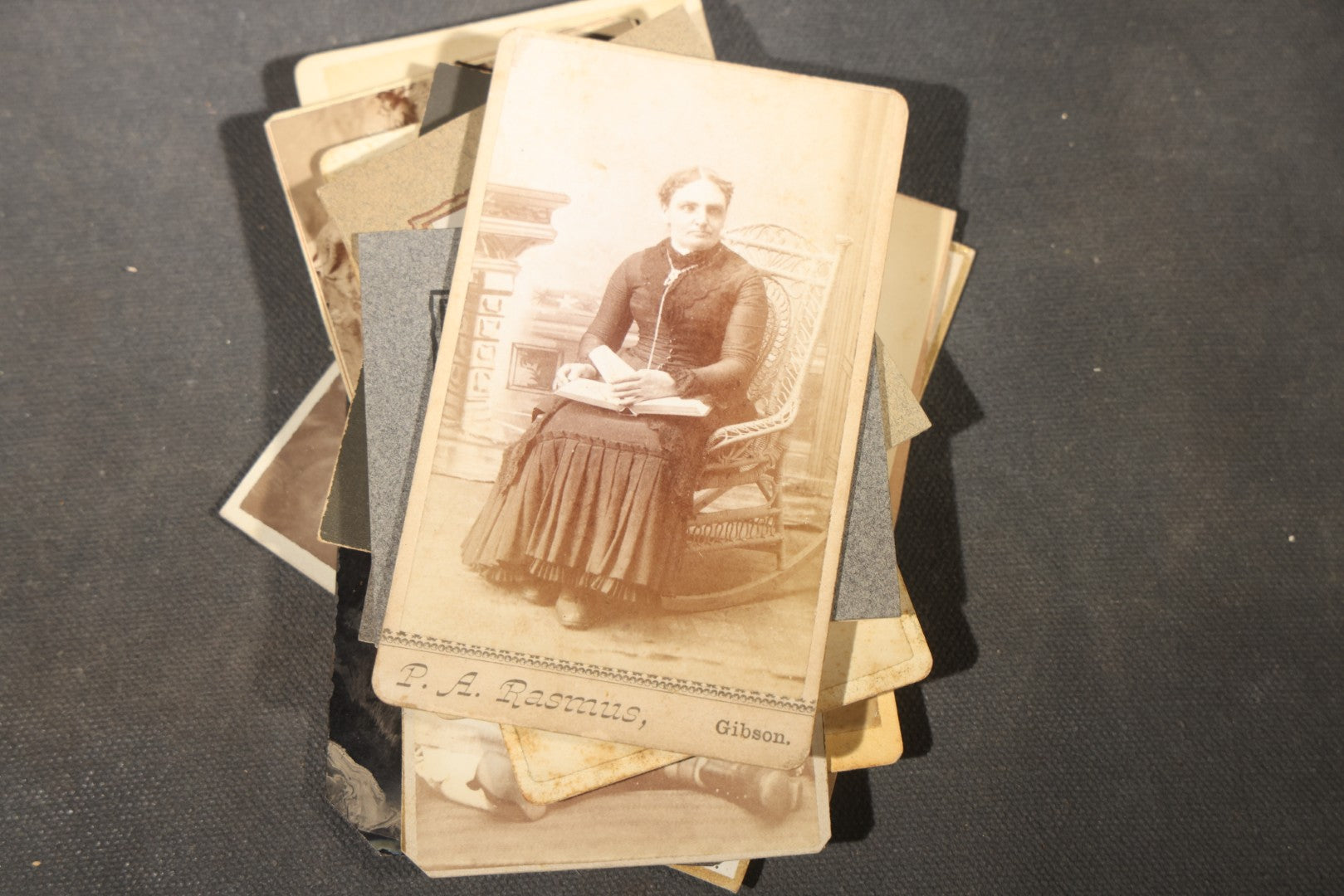 Grouping of 40+ Antique Photographs Including Carte De Visite C.D.V. Portraits, Tintype Photographs, and Board-Mounted Photographs, including young children, women with curled bangs, and more