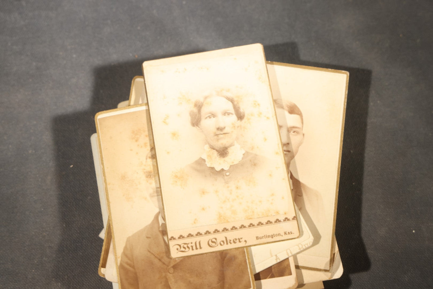 Grouping of 40+ Antique Photographs Including Carte De Visite C.D.V. Portraits, Tintype Photographs, and Board-Mounted Photographs, including young children, women with curled bangs, and more