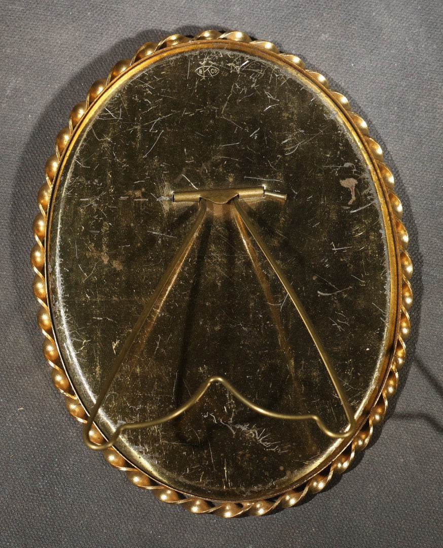 Pair of Antique Framed Oval Portrait Photographs of a Young Soldier and a Young Girl in Brass Frames with Convex Glass