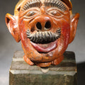 Lot 193 - Vintage Folk Art Carved and Painted Wooden Caricature Head of a Mustached Man in a Cap on Removable Block Base, Chip to Hat, 6-3/4" H