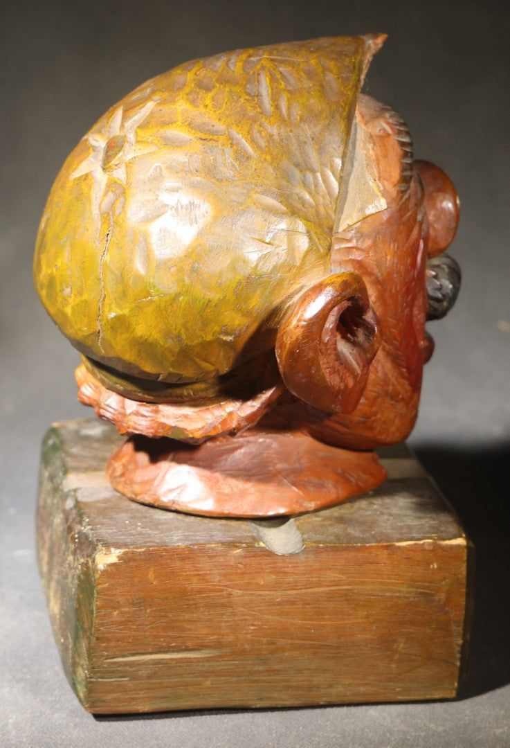 Vintage Folk Art Carved and Painted Wooden Caricature Head of a Mustached Man in a Cap on Removable Block Base, Chip to Hat
