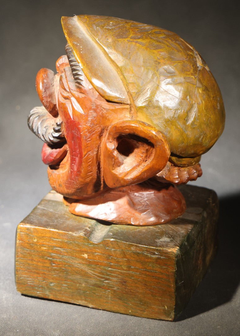 Vintage Folk Art Carved and Painted Wooden Caricature Head of a Mustached Man in a Cap on Removable Block Base, Chip to Hat