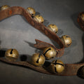 Lot 195 - Antique Leather Strap of Brass Sleigh Bells with 1870s Patent Dates, 39" L