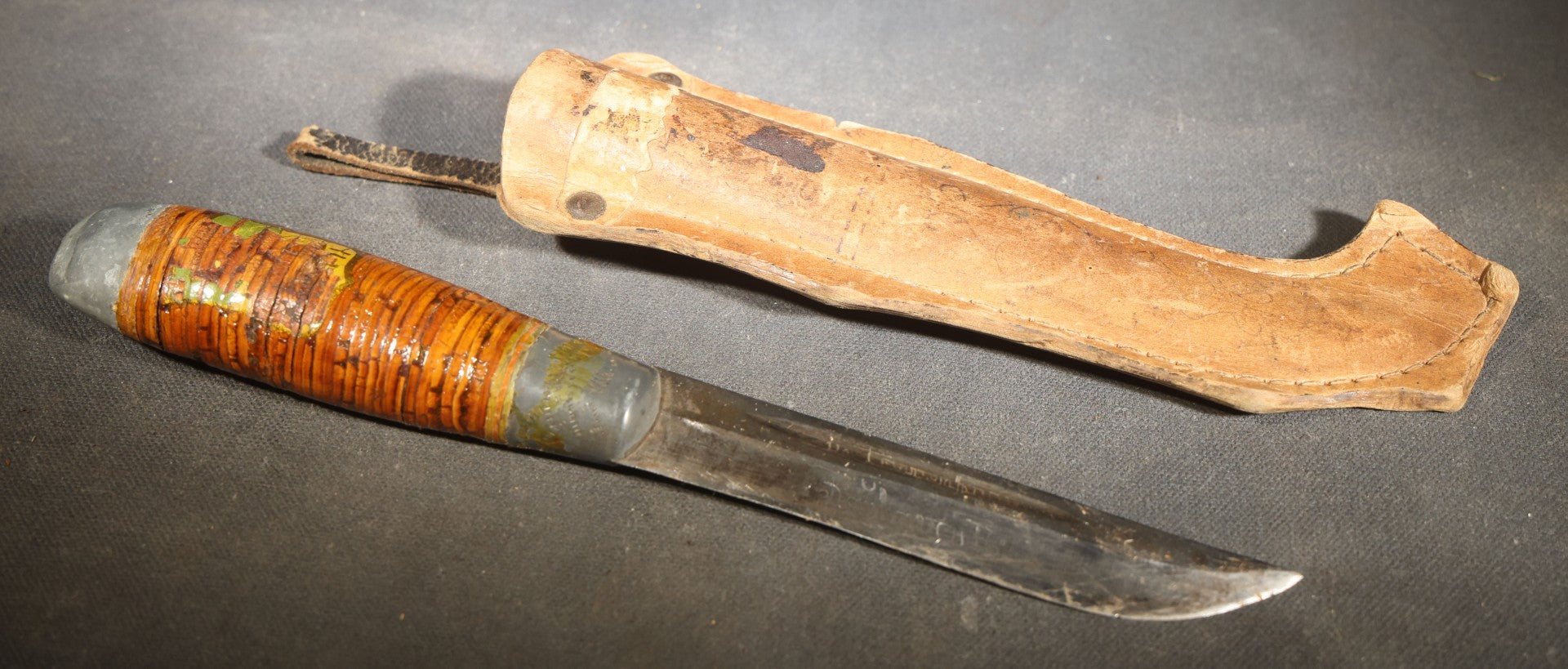 Vintage WWII-Era Finnish Puukko Knife with Stacked Birch Bark Handle and Pressed Paper Sheath, Manufactured by Jarvenpaa