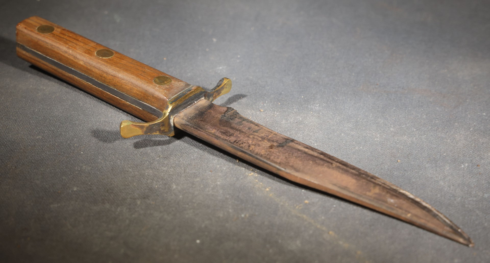 Vintage Unmarked Dagger Knife with Wood Grip, Brass Cross Guard, and Brass Rivets