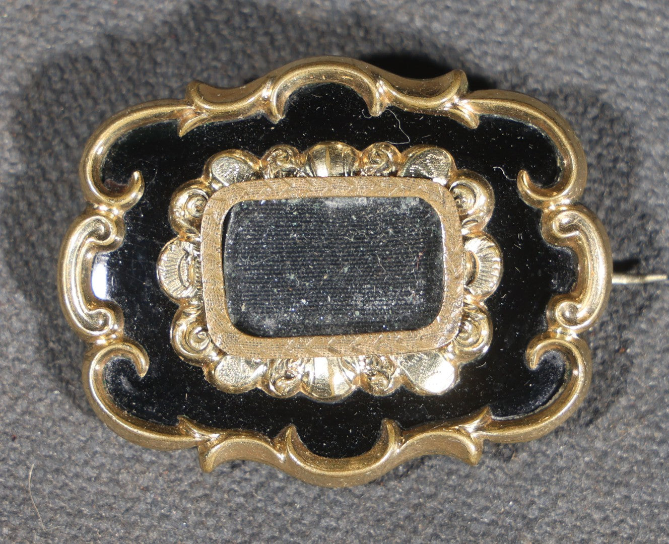 Antique Victorian Hairwork Brooch with Black Enamel, Scroll Border, and Hair Compartment Under Glass