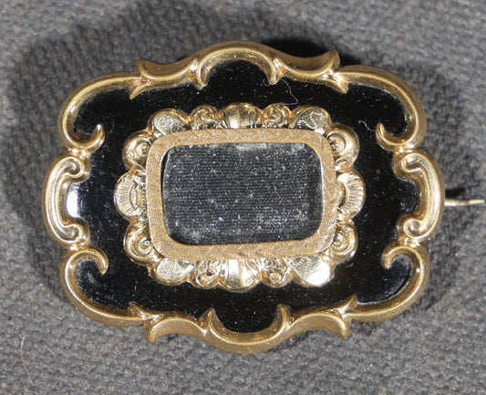 Antique Victorian Hairwork Brooch with Black Enamel, Scroll Border, and Hair Compartment Under Glass