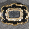 Lot 210 - Antique Victorian Hairwork Brooch with Black Enamel, Scroll Border, and Hair Compartment Under Glass, 1-1/2" L x 1-1/8" W
