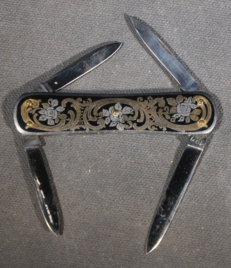 Vintage EKA Sweden Four-Blade Folding Pocket Knife with Damascene Floral Scrollwork and Swedish Coat of Arms, Manufactured by EKA, Eskilstuna, Sweden