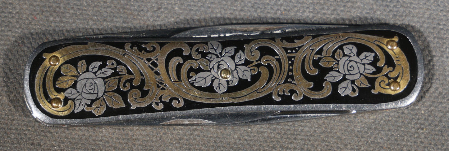 Vintage EKA Sweden Four-Blade Folding Pocket Knife with Damascene Floral Scrollwork and Swedish Coat of Arms, Manufactured by EKA, Eskilstuna, Sweden