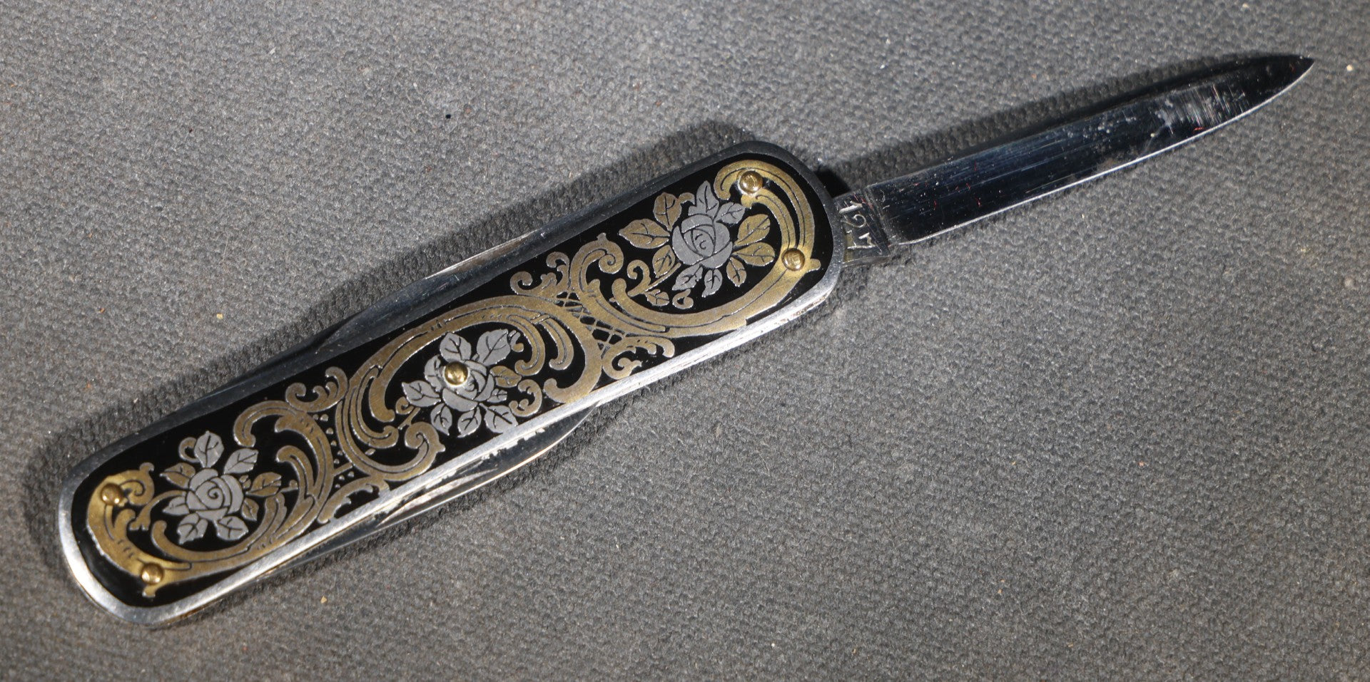 Vintage EKA Sweden Four-Blade Folding Pocket Knife with Damascene Floral Scrollwork and Swedish Coat of Arms, Manufactured by EKA, Eskilstuna, Sweden