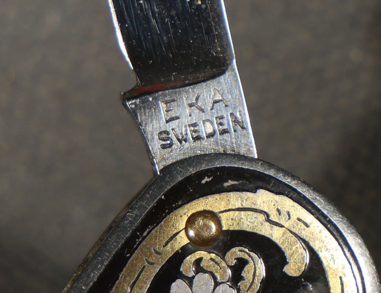 Vintage EKA Sweden Four-Blade Folding Pocket Knife with Damascene Floral Scrollwork and Swedish Coat of Arms, Manufactured by EKA, Eskilstuna, Sweden