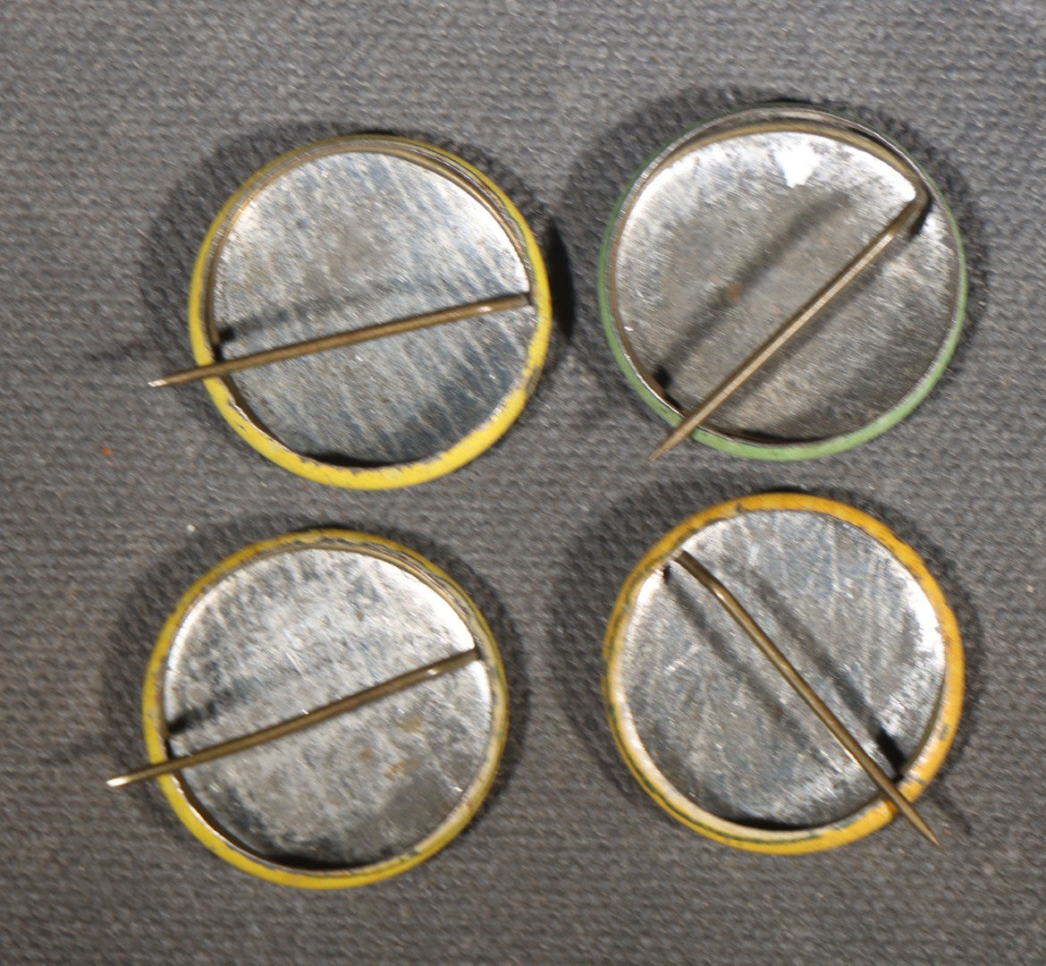 Grouping of Eight Antique and Vintage Pinback Buttons including Four "G'Bye Boys It's Bug-A-Boo" Insecticide Advertising Buttons and Four Photographic Portrait Buttons