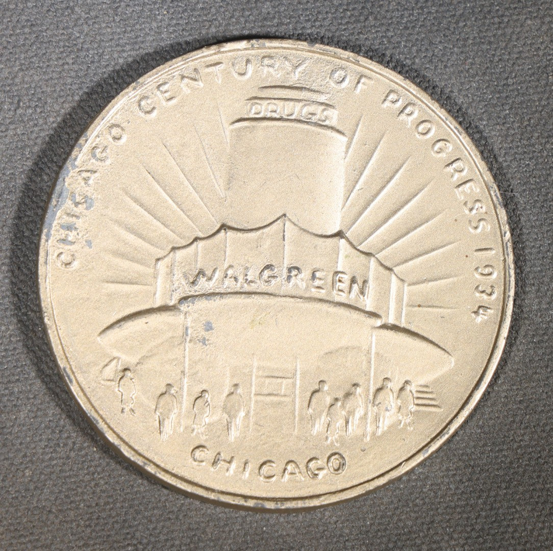 Trio of Antique and Vintage Commemorative Medallions including 1934 Chicago Century of Progress Walgreen Drugs, 1939 Dodge Silver Anniversary, and Something Special Scotch Whisky Playing Card Spinner
