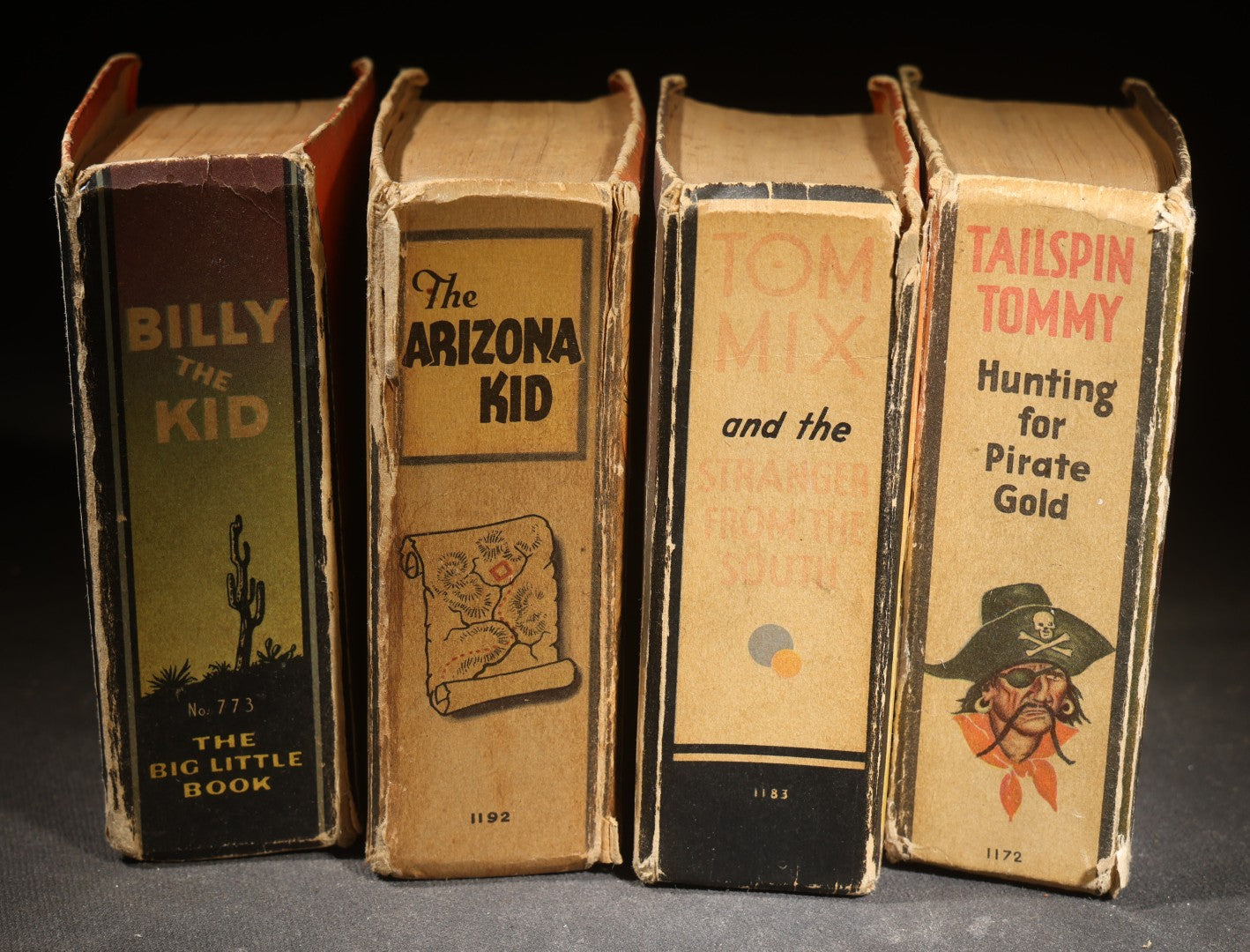 Grouping of Four Antique Big Little Books Including "Billy the Kid," "Tailspin Tommy," "Tom Mix," And "The Arizona Kid," Published by Whitman Publishing Co., Racine, Wisconsin