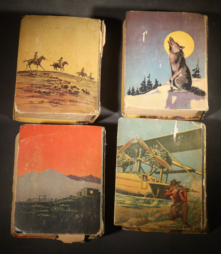 Grouping of Four Antique Big Little Books Including "Billy the Kid," "Tailspin Tommy," "Tom Mix," And "The Arizona Kid," Published by Whitman Publishing Co., Racine, Wisconsin