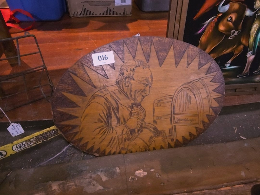 pyrography wood burning of priest with beer