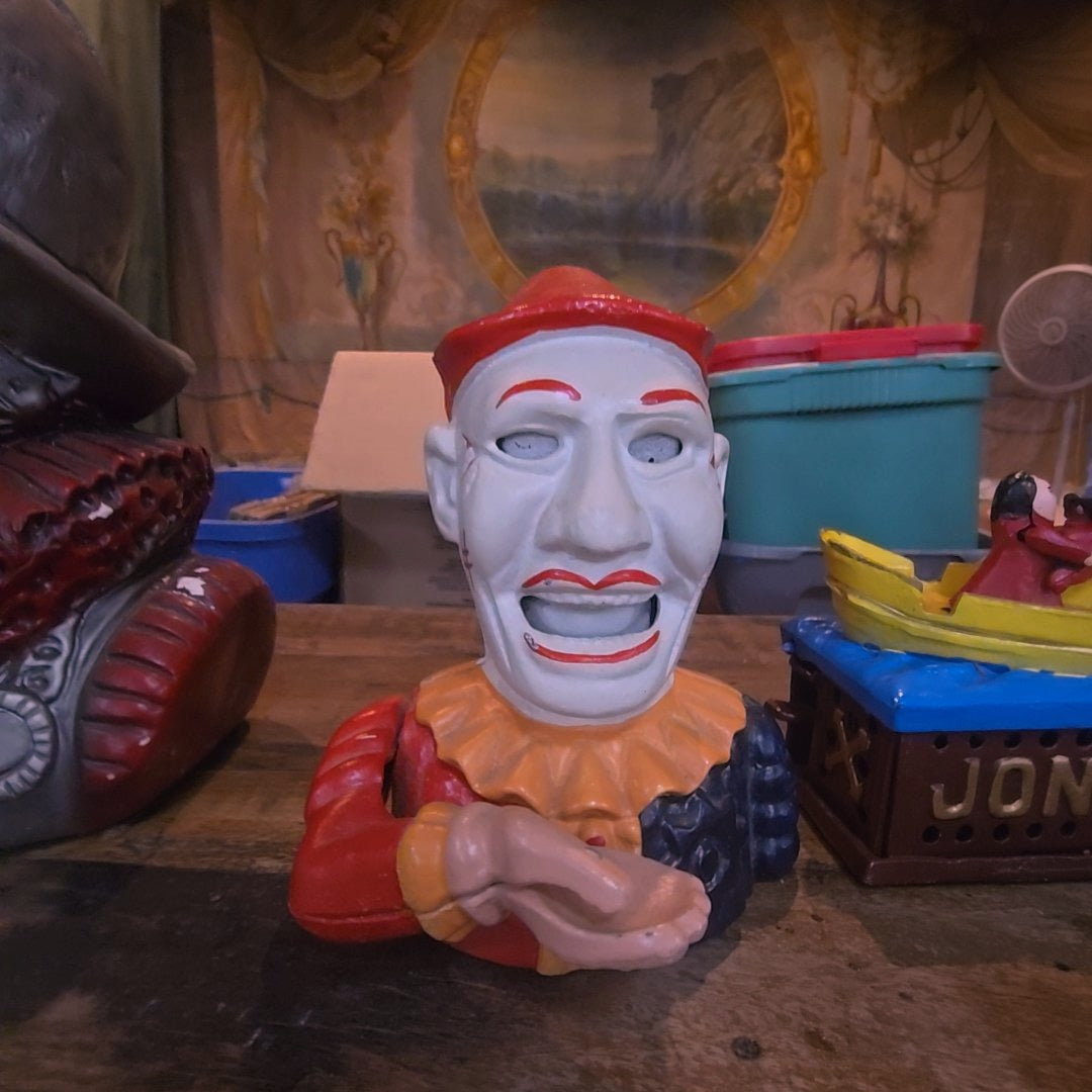 reproduction cast iron clown Bank