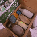 Lot 094 - Box Lot with Stoneware and Tins