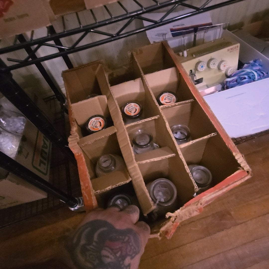 box lot of milk bottles