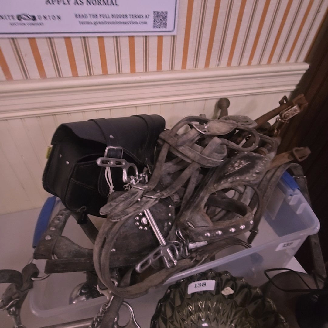 box lot with horse hardware and motorcycle saddlebag
