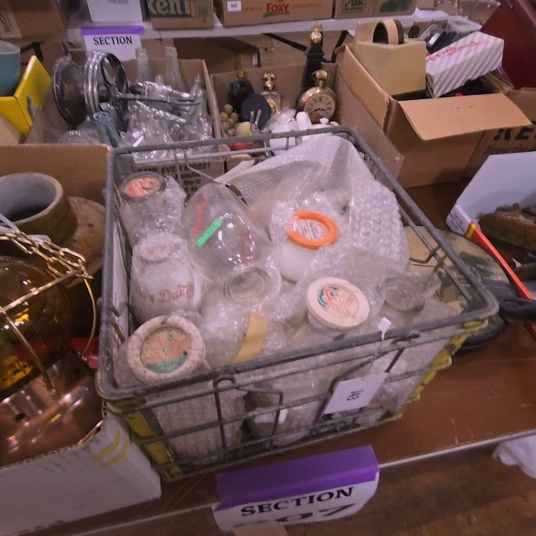 crate with milk bottles