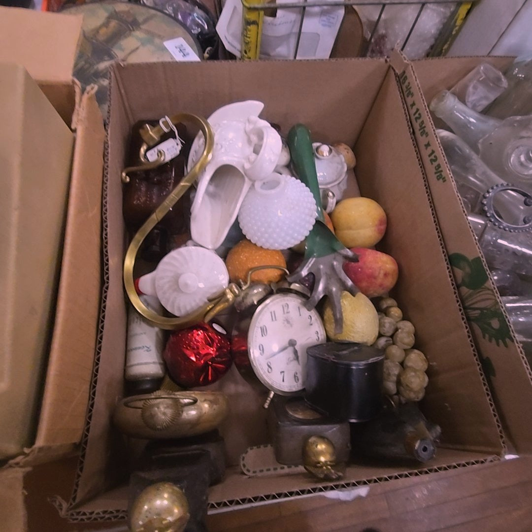 box lot with stone fruit, glass, Avon bottles and more