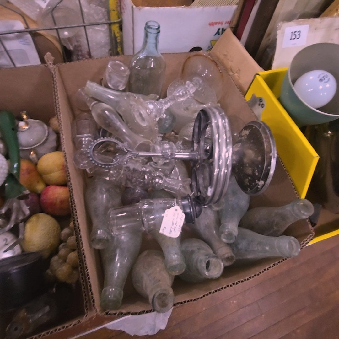 box lot with torpedo bottles and other clear glass